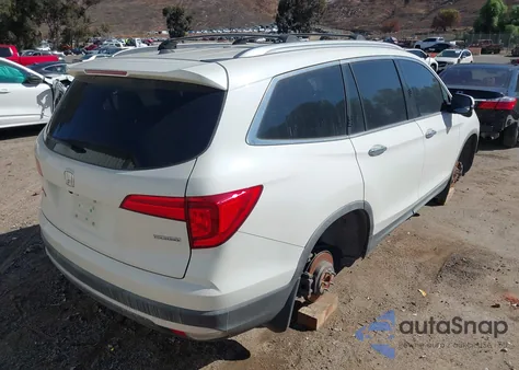 2016 Honda Pilot Touring из США, поврежденный, VIN 5FNYF5H91GB013966